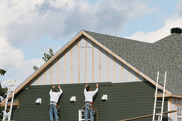 Professional Siding technician working in Zirconia, NC